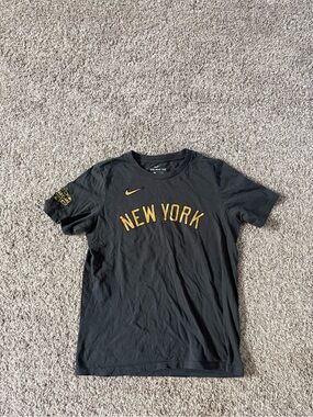 Nike Black Tee with Gold 'New York' Lettering